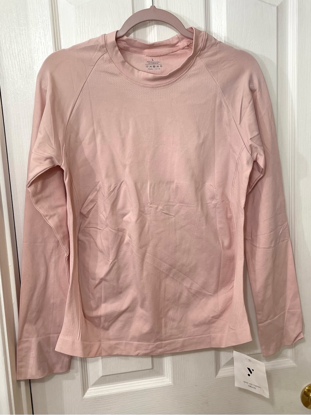 Light Pink Long-Sleeve Performance Tee by Sweaty Betty